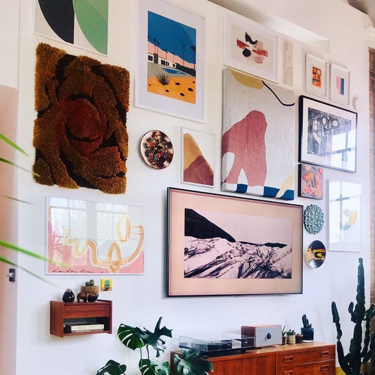 Lovely gallery wall with Palm Springs Bungalow & Wexler Barlow House art prints