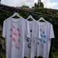 Kuchen Shirt gegen Rassismus / Print Coral